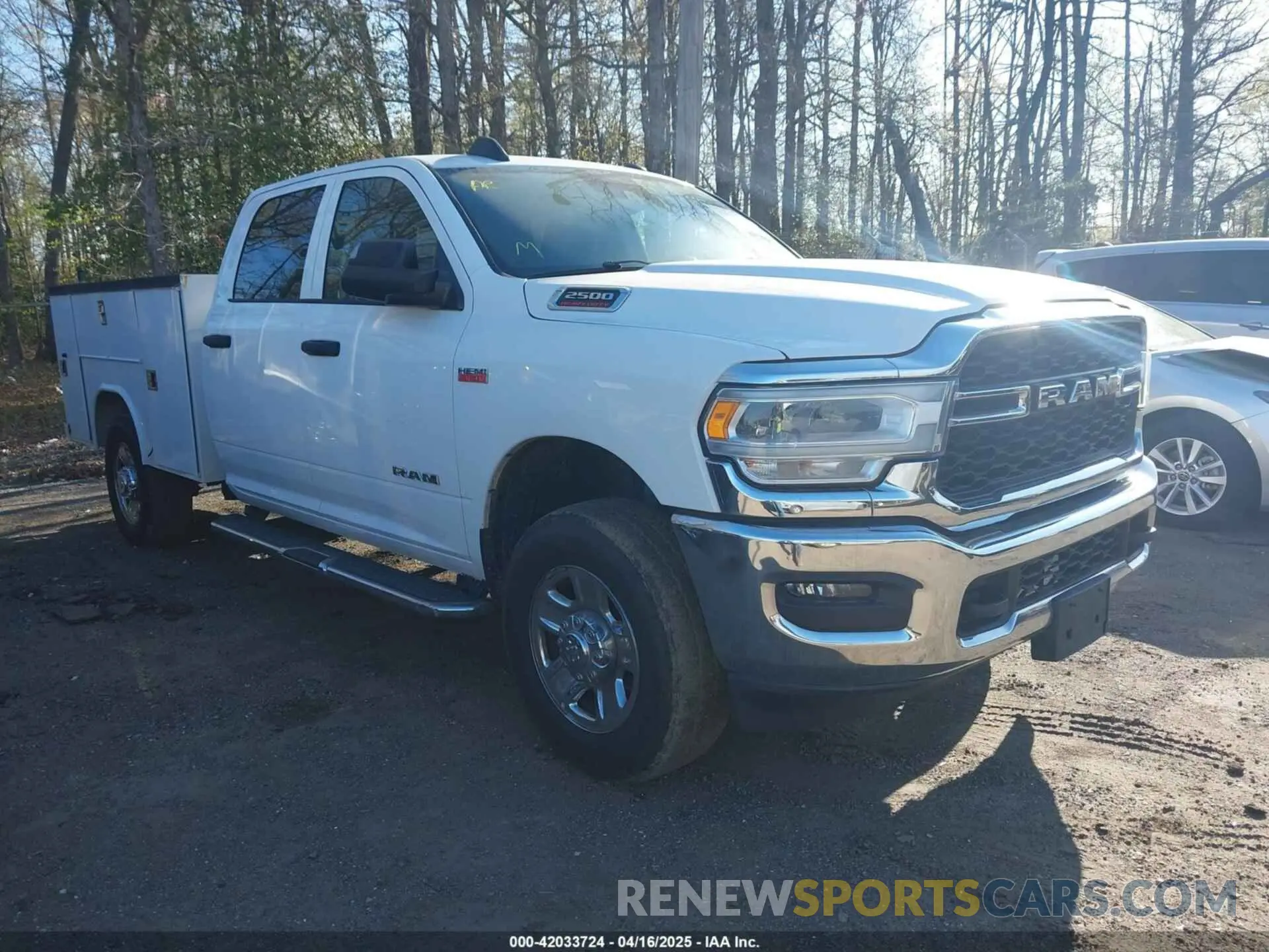 1 Photograph of a damaged car 3C6UR5HJ7KG650371 RAM 2500 2019