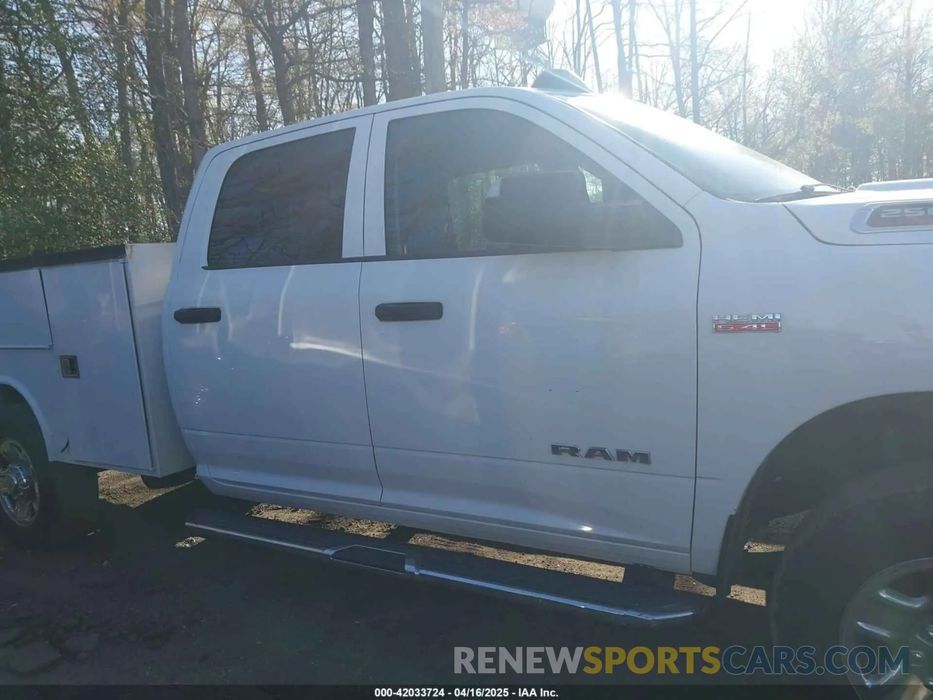 13 Photograph of a damaged car 3C6UR5HJ7KG650371 RAM 2500 2019