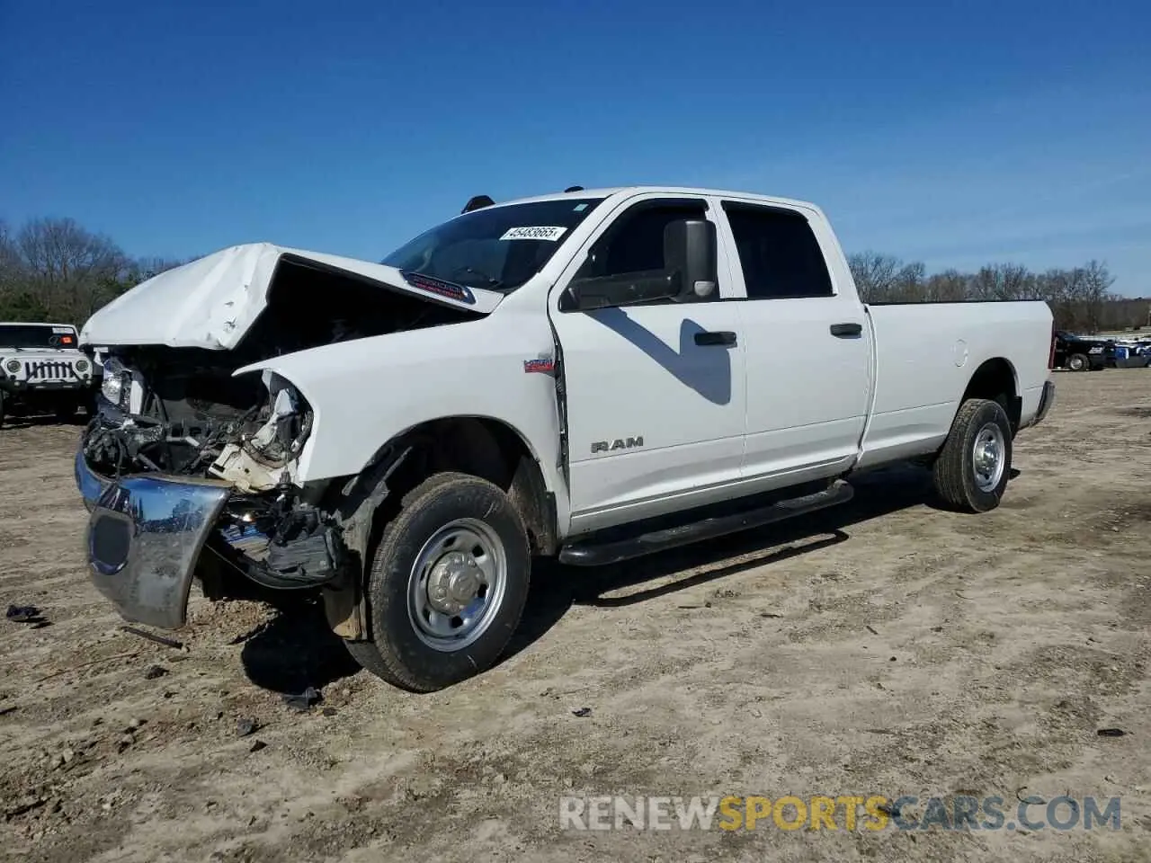 1 Photograph of a damaged car 3C6UR5HJ8KG587569 RAM 2500 2019