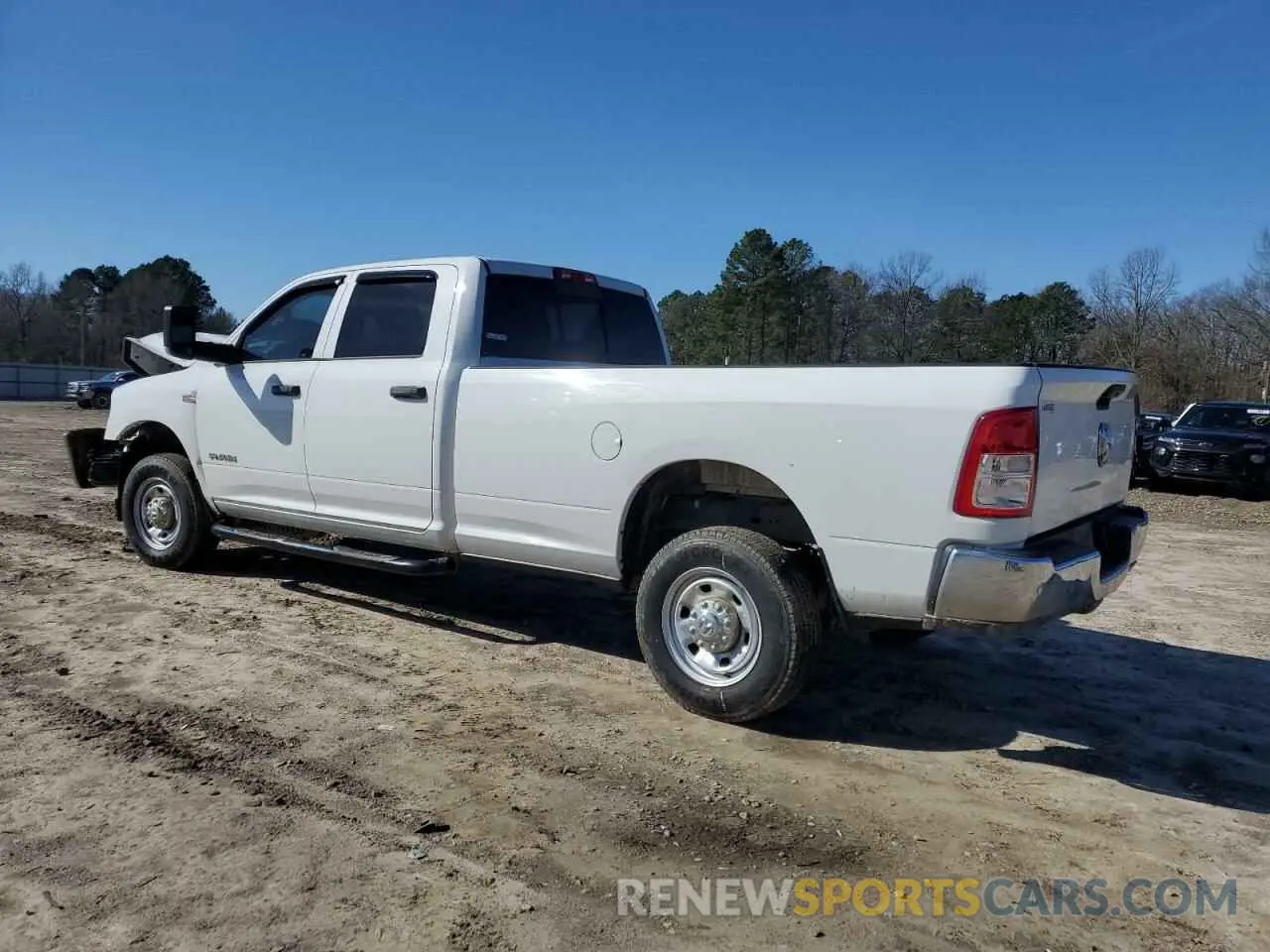 2 Photograph of a damaged car 3C6UR5HJ8KG587569 RAM 2500 2019