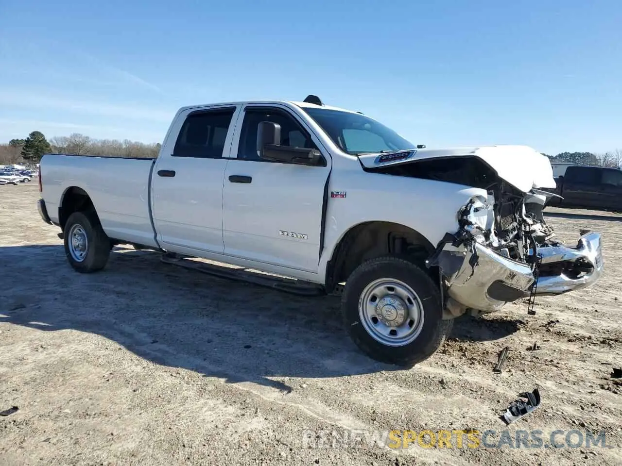 4 Photograph of a damaged car 3C6UR5HJ8KG587569 RAM 2500 2019
