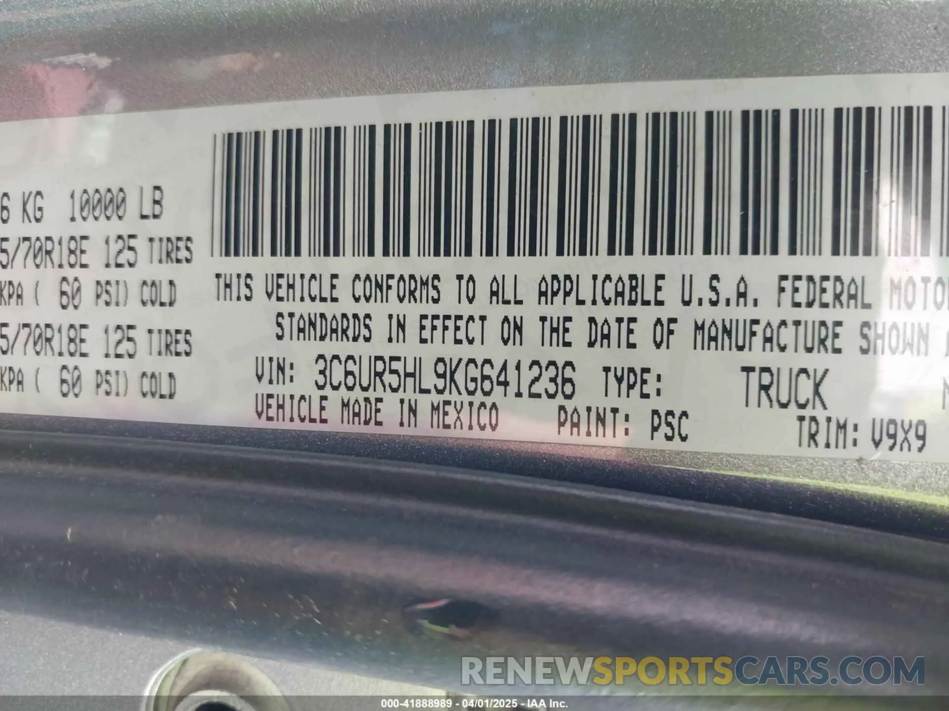 9 Photograph of a damaged car 3C6UR5HL9KG641236 RAM 2500 2019