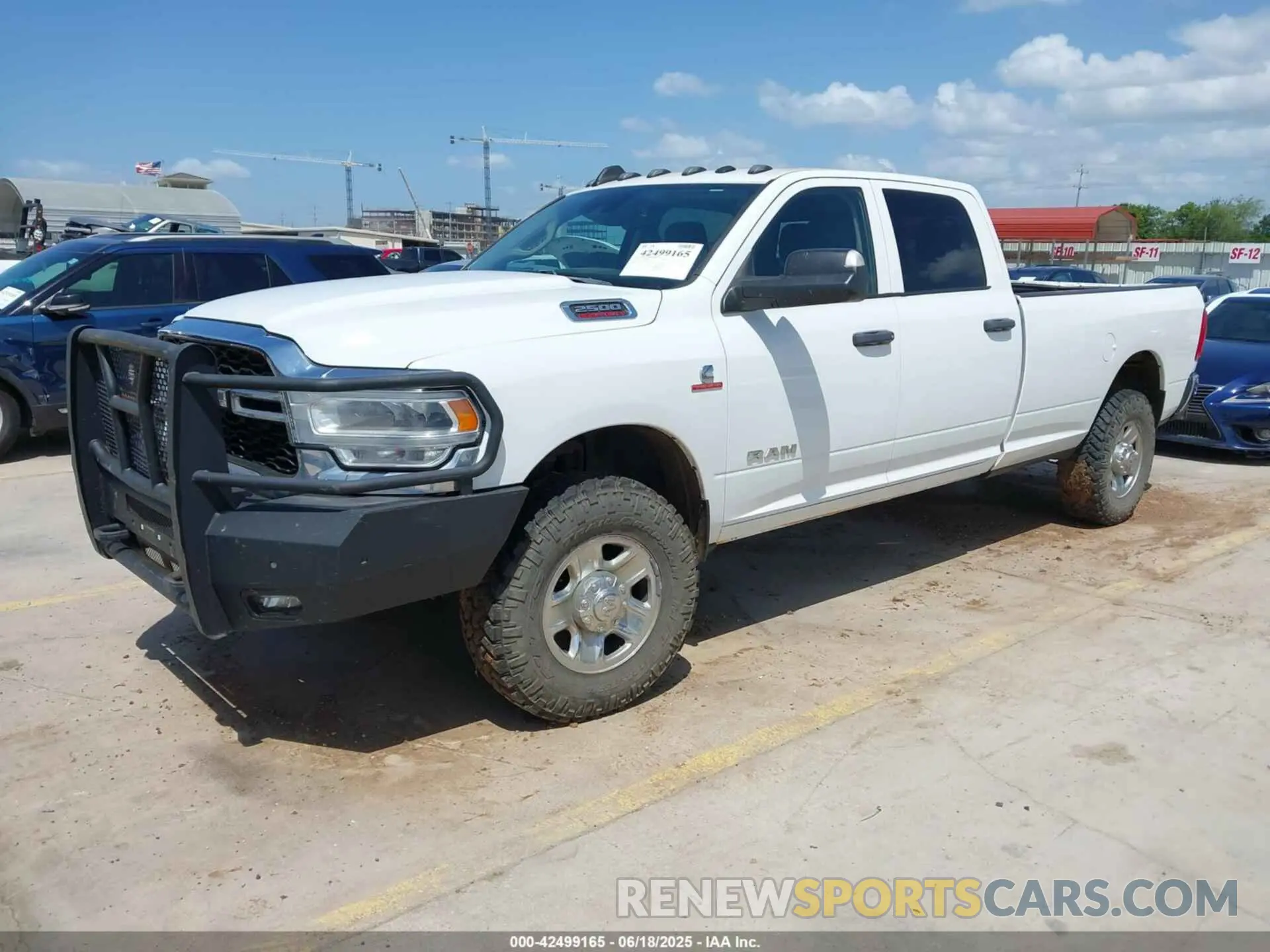 2 Photograph of a damaged car 3C6UR5HLXKG621237 RAM 2500 2019