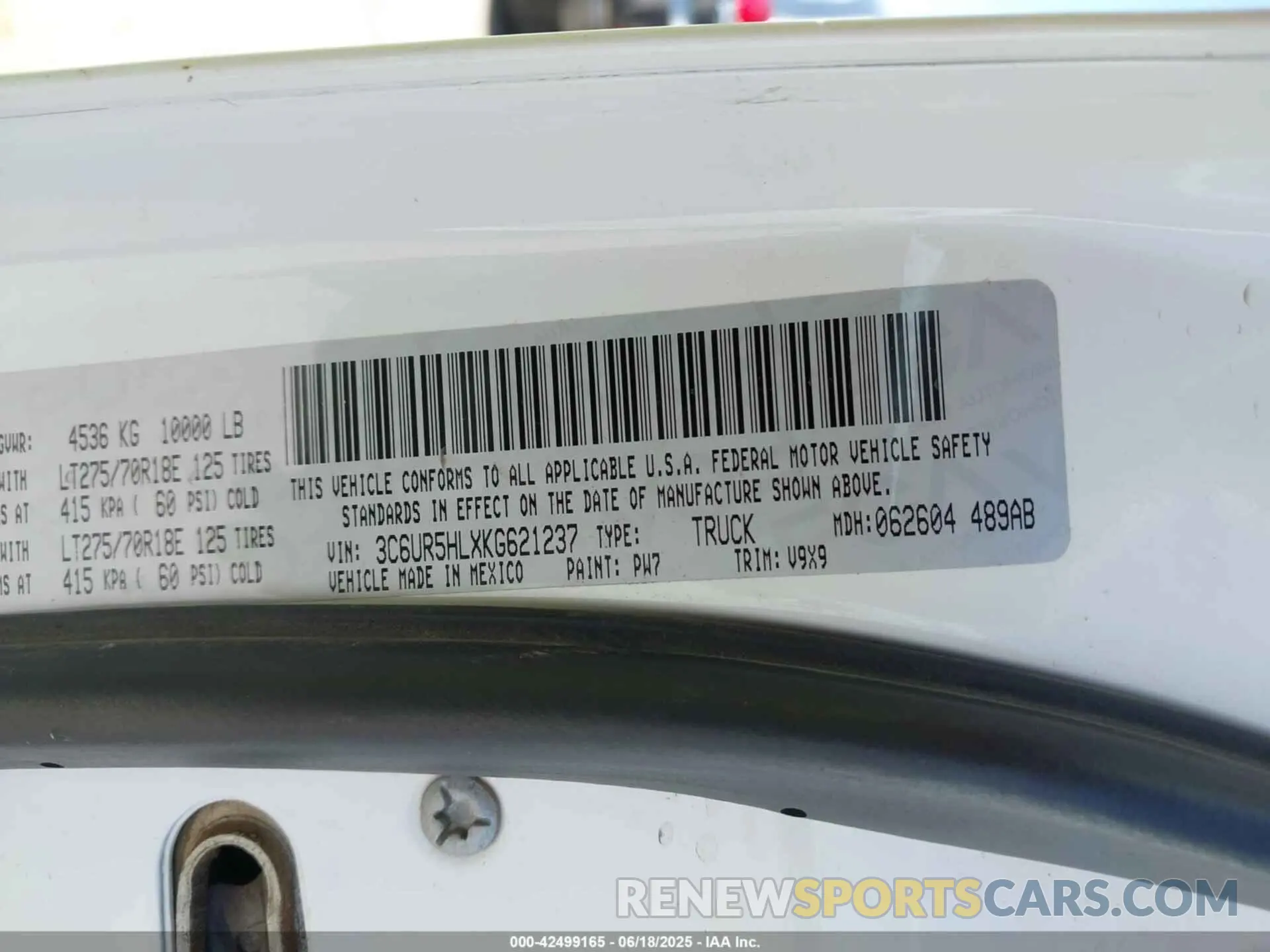 9 Photograph of a damaged car 3C6UR5HLXKG621237 RAM 2500 2019
