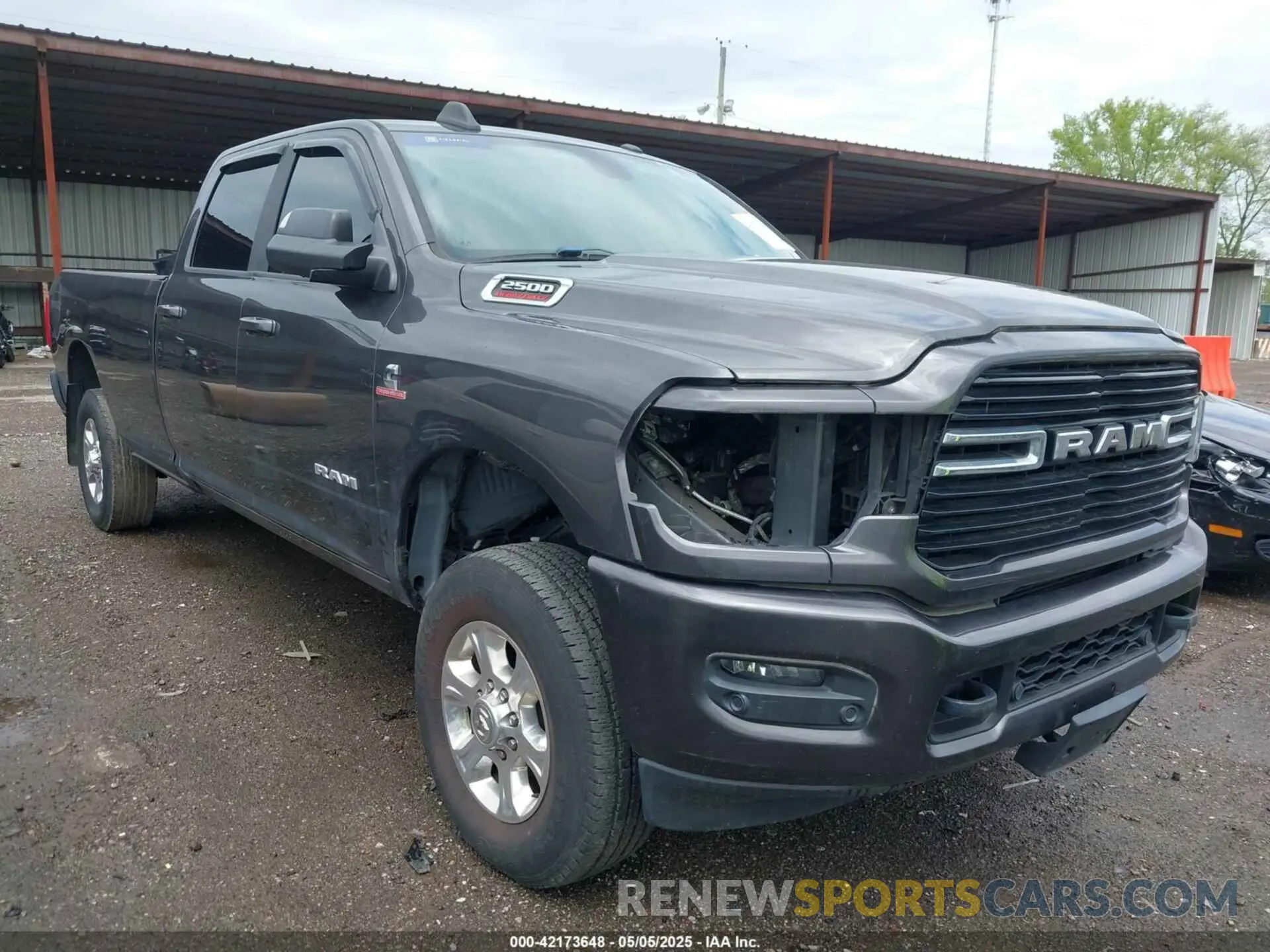 1 Photograph of a damaged car 3C6UR5JL0KG690383 RAM 2500 2019