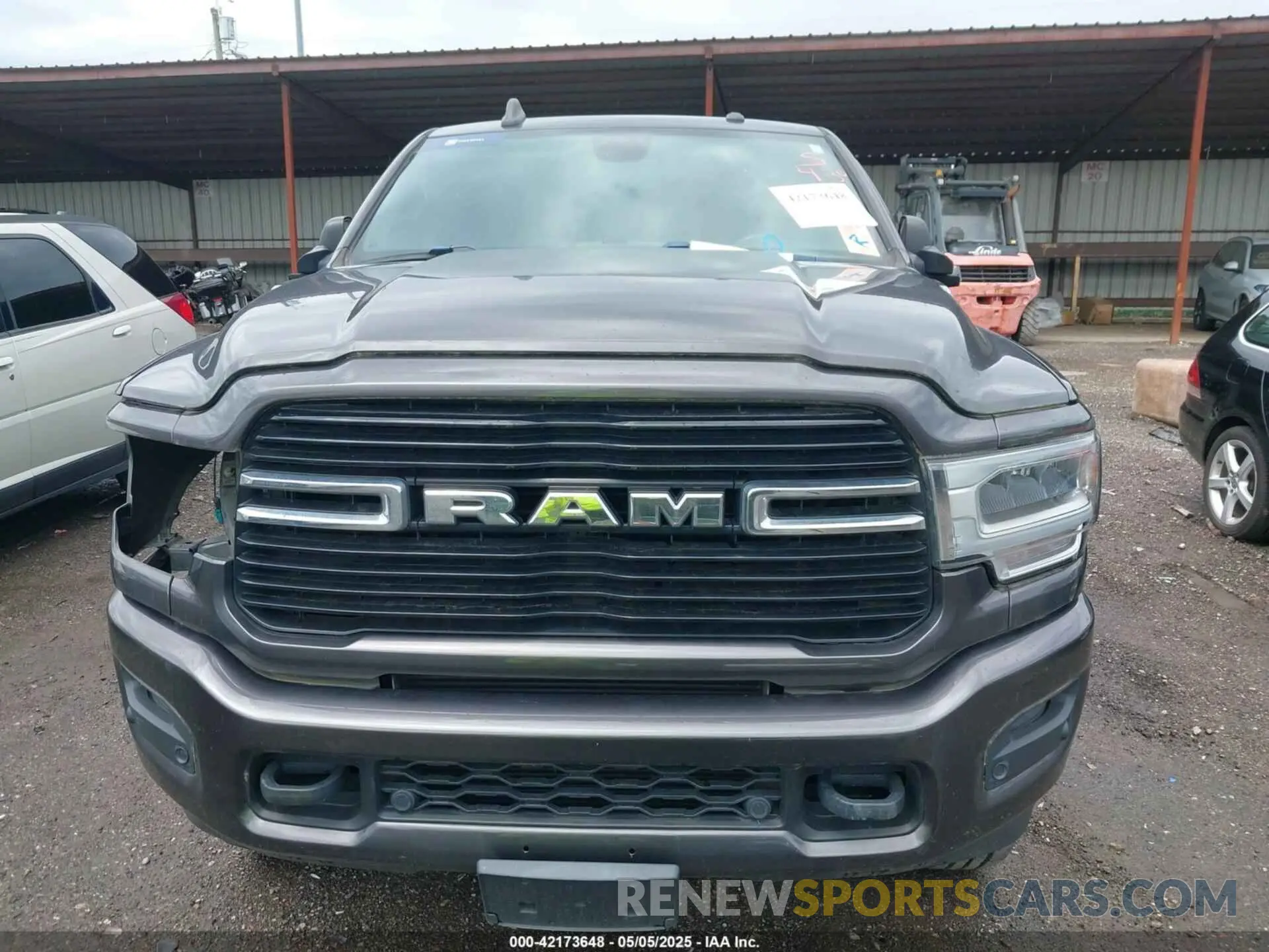 12 Photograph of a damaged car 3C6UR5JL0KG690383 RAM 2500 2019