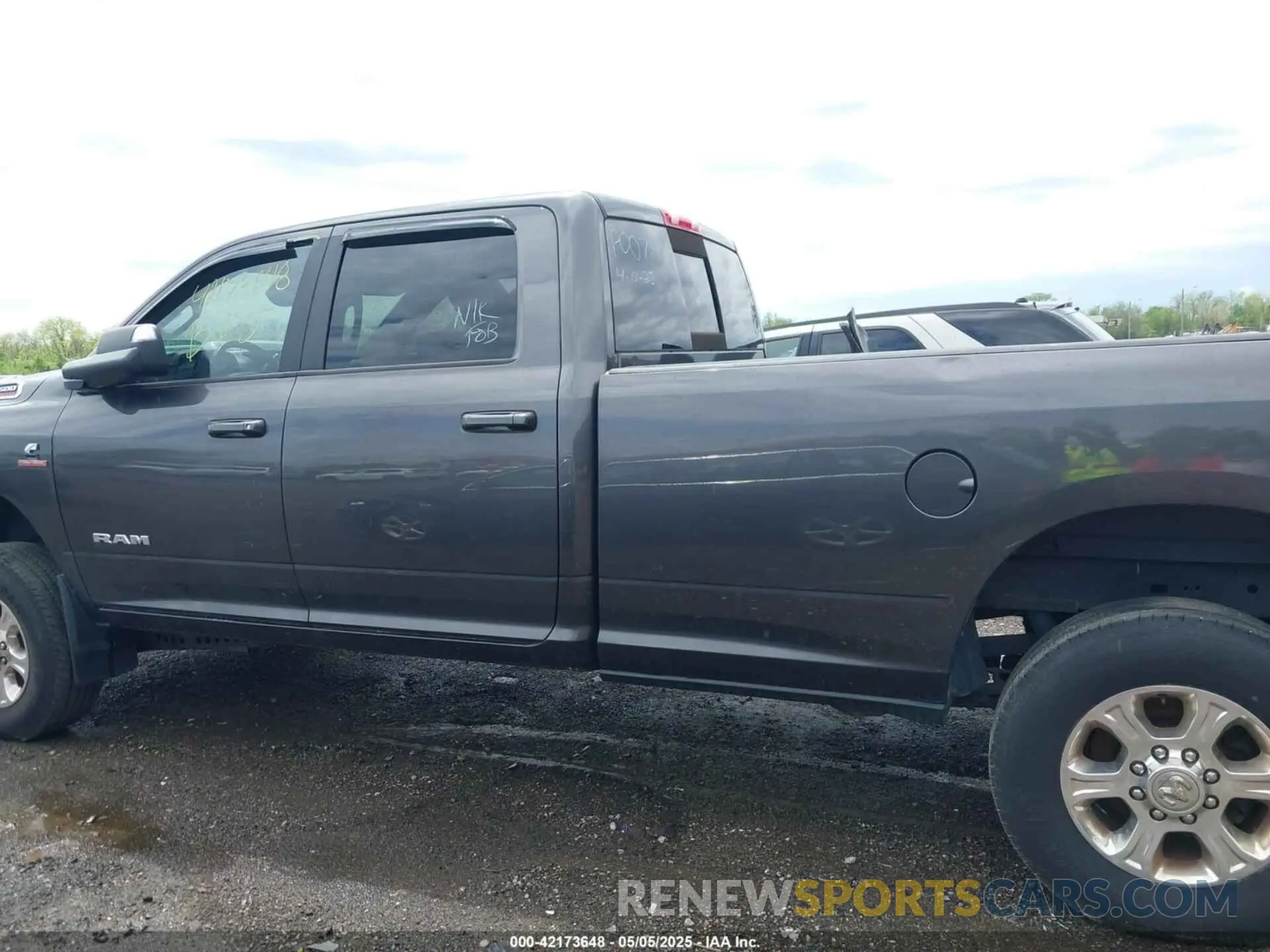 14 Photograph of a damaged car 3C6UR5JL0KG690383 RAM 2500 2019