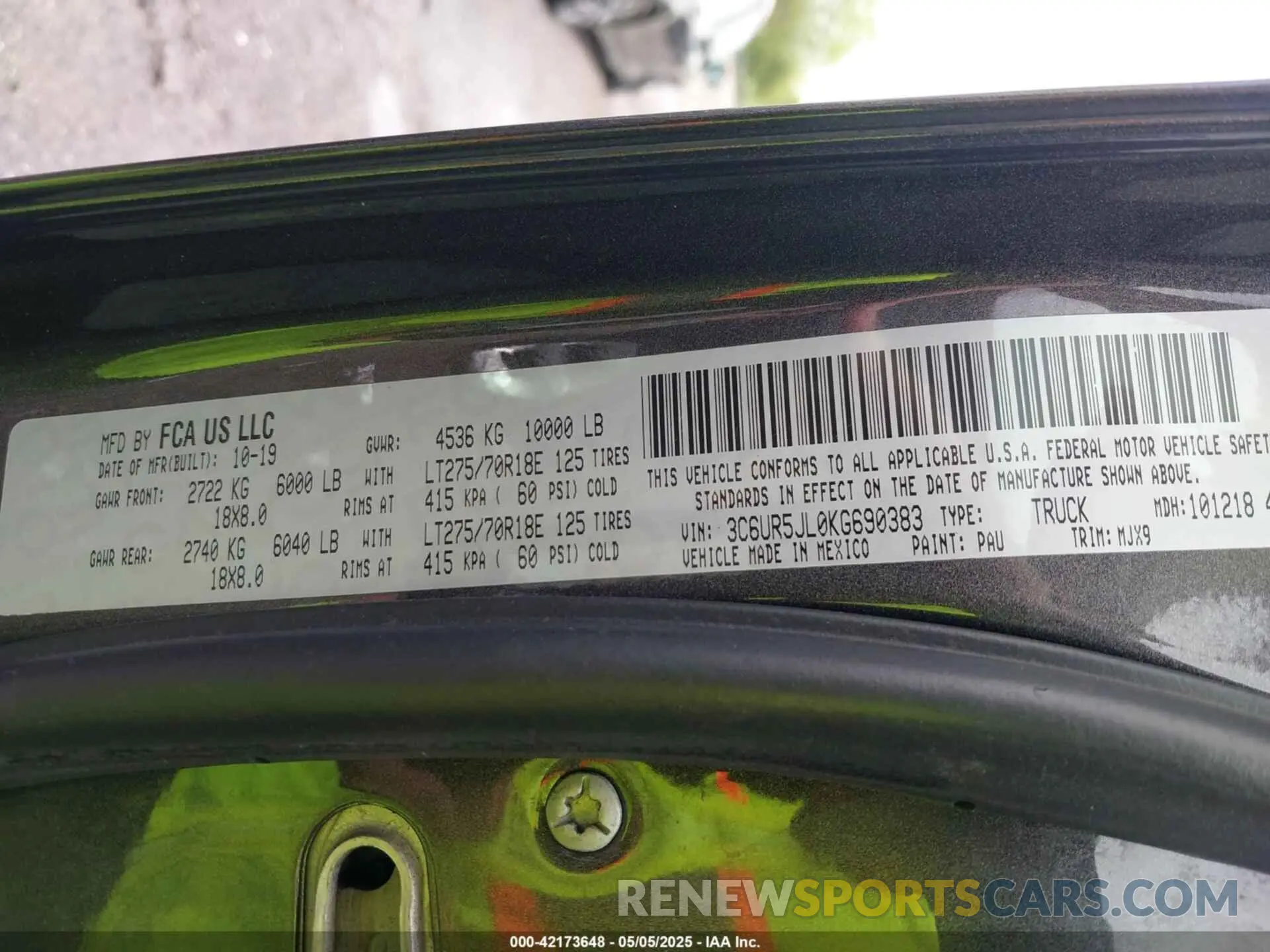 9 Photograph of a damaged car 3C6UR5JL0KG690383 RAM 2500 2019