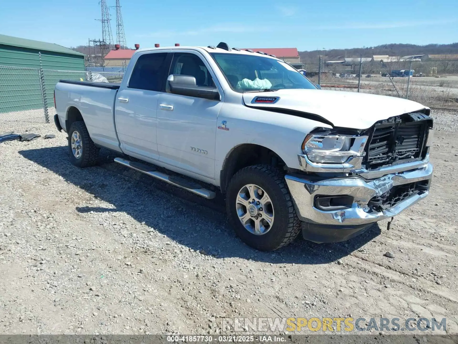 1 Photograph of a damaged car 3C6UR5JL1KG601176 RAM 2500 2019