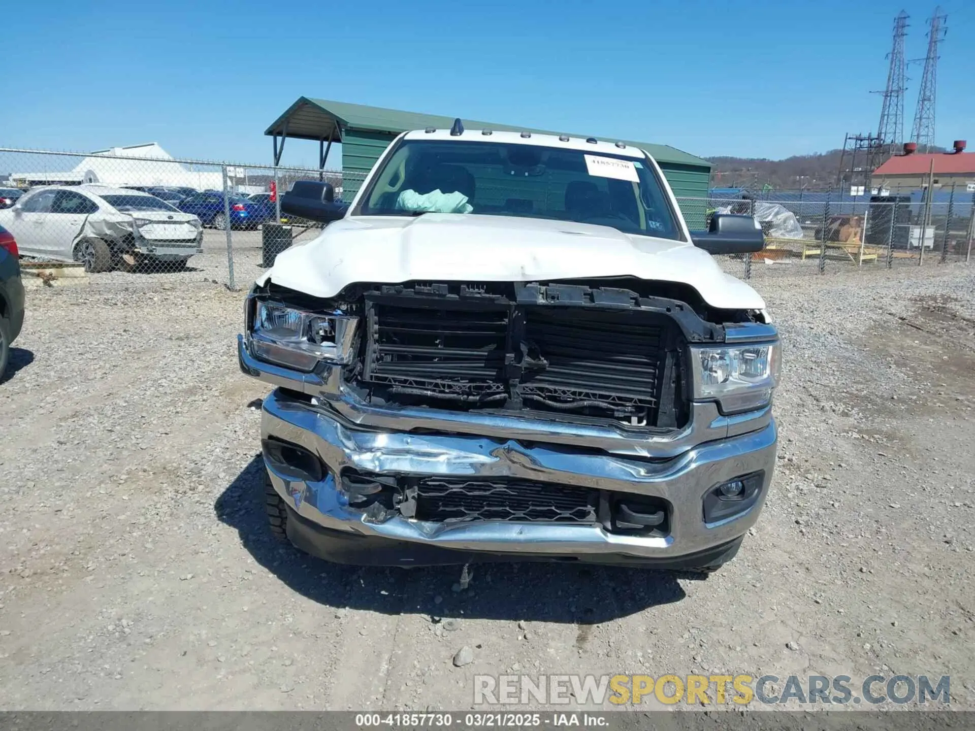13 Photograph of a damaged car 3C6UR5JL1KG601176 RAM 2500 2019