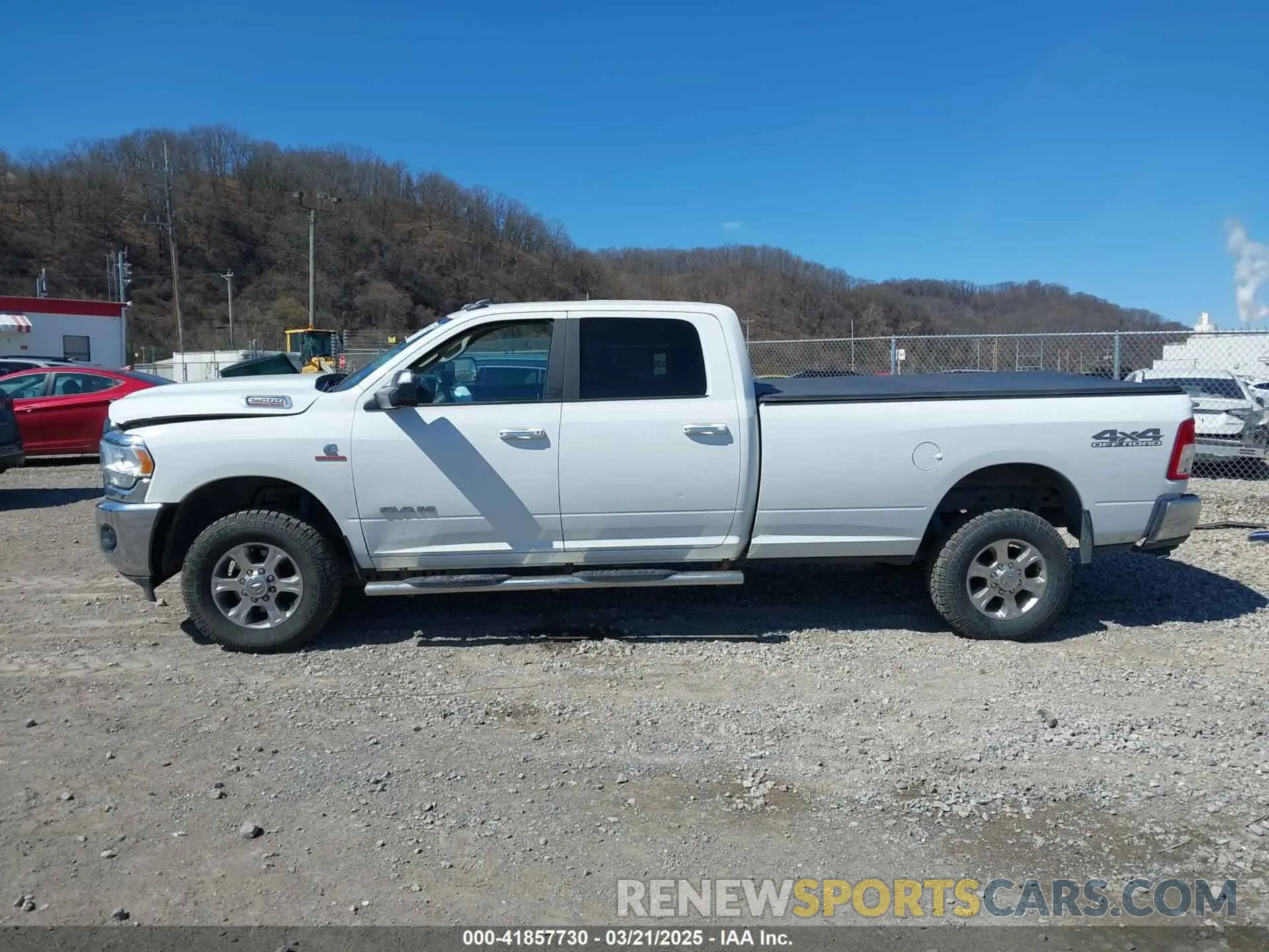15 Photograph of a damaged car 3C6UR5JL1KG601176 RAM 2500 2019
