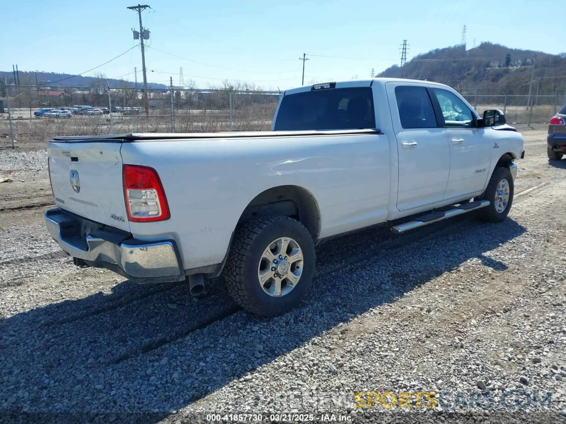 4 Photograph of a damaged car 3C6UR5JL1KG601176 RAM 2500 2019