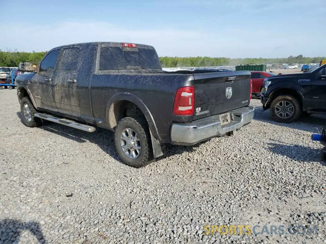 2 Photograph of a damaged car 3C6UR5NL0KG702140 RAM 2500 2019