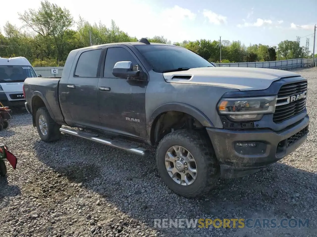 4 Photograph of a damaged car 3C6UR5NL0KG702140 RAM 2500 2019