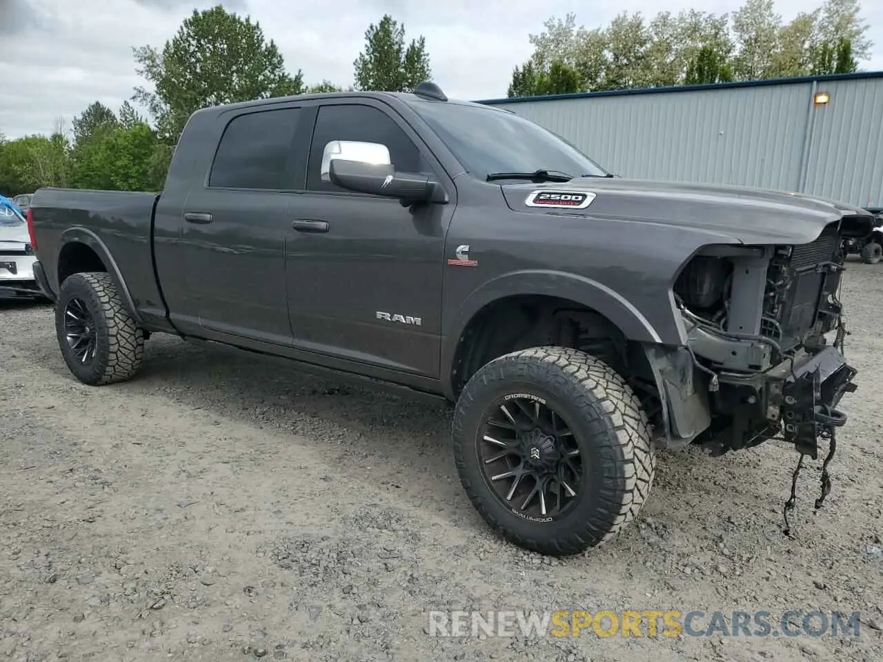 4 Photograph of a damaged car 3C6UR5NL1KG655006 RAM 2500 2019