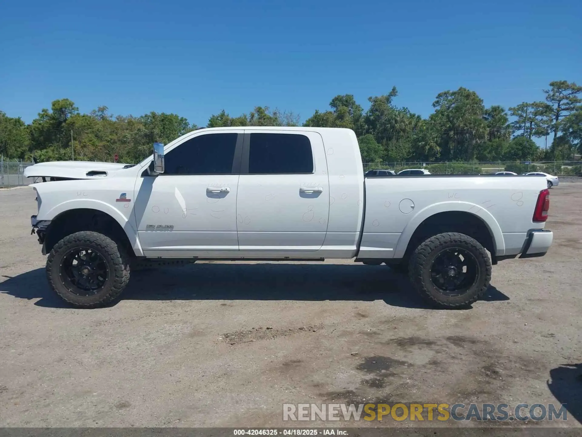 15 Photograph of a damaged car 3C6UR5NL2KG718789 RAM 2500 2019