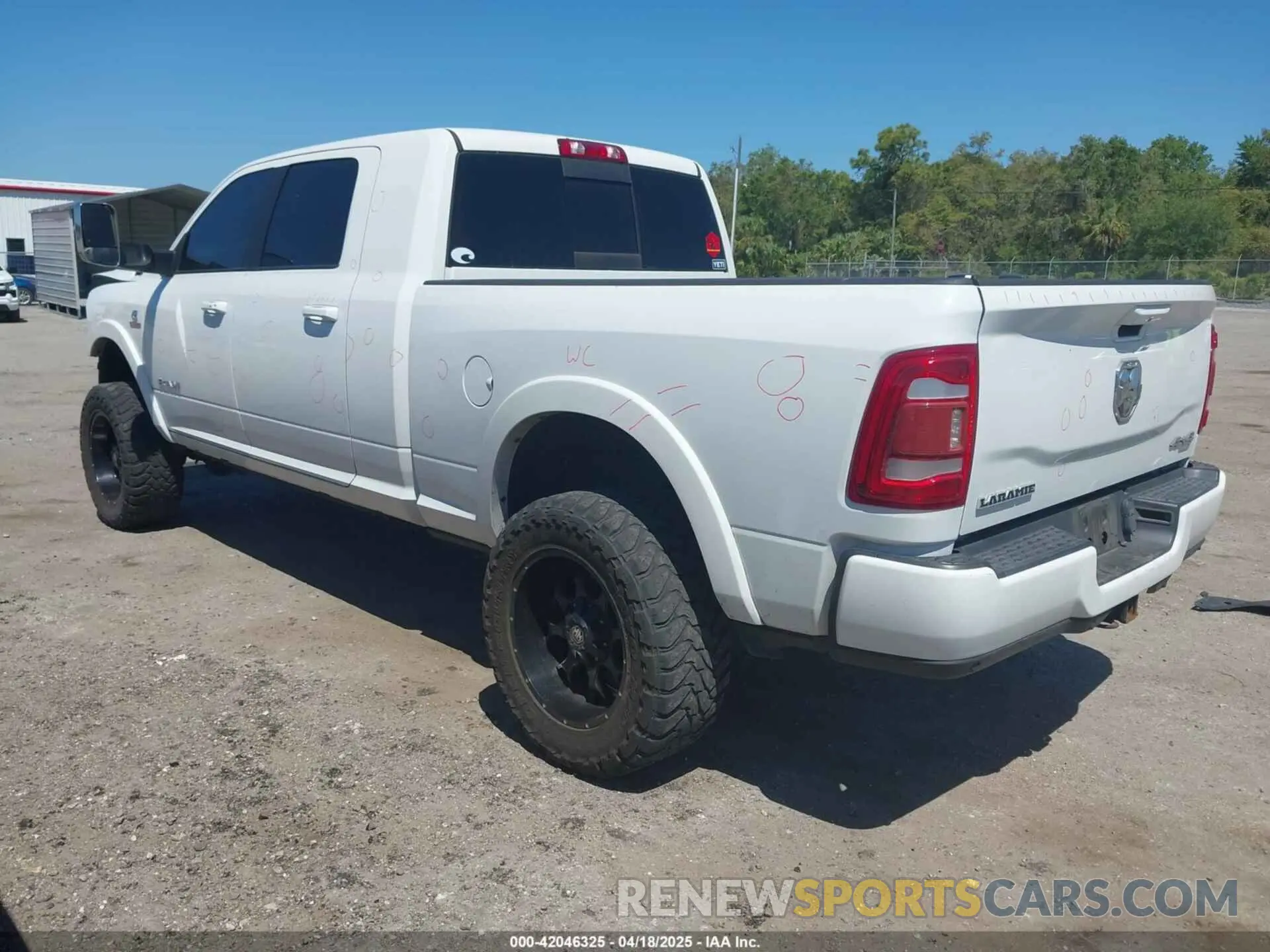 3 Photograph of a damaged car 3C6UR5NL2KG718789 RAM 2500 2019