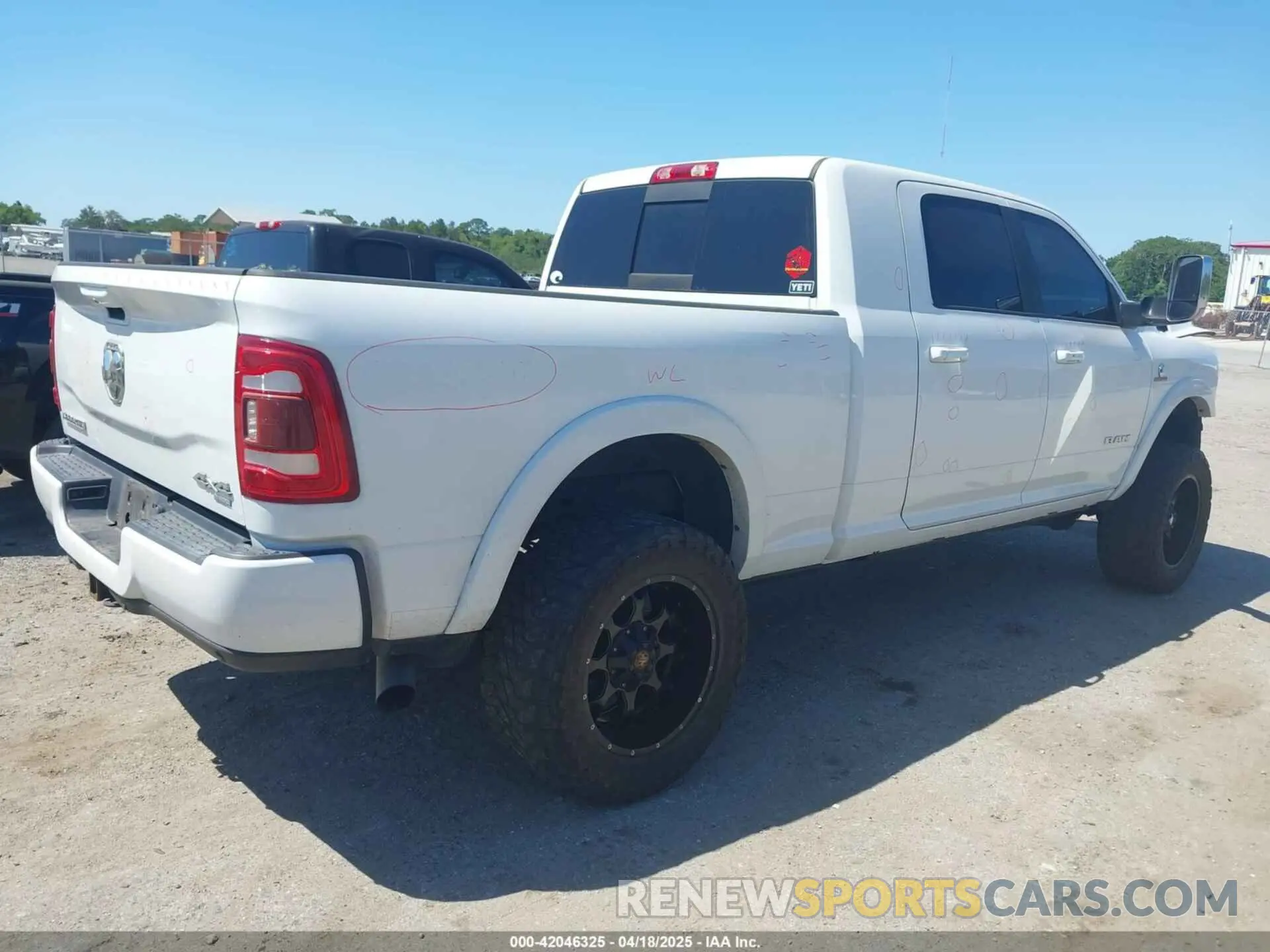 4 Photograph of a damaged car 3C6UR5NL2KG718789 RAM 2500 2019