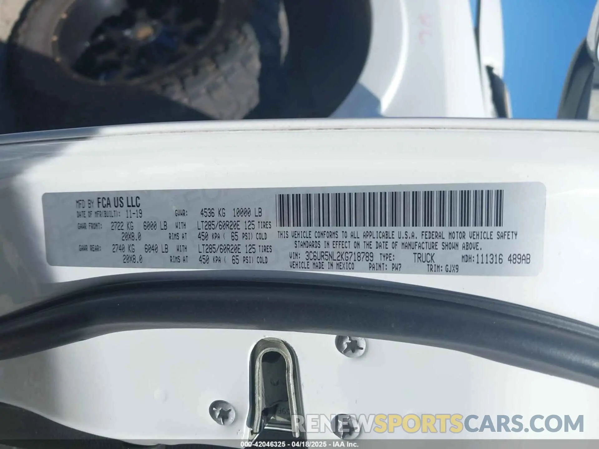 9 Photograph of a damaged car 3C6UR5NL2KG718789 RAM 2500 2019