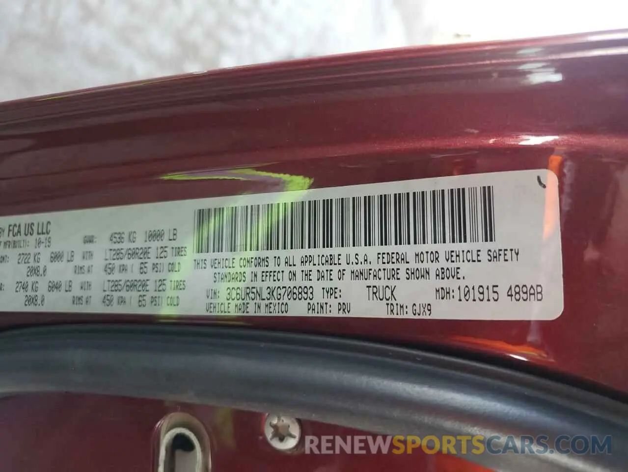 13 Photograph of a damaged car 3C6UR5NL3KG706893 RAM 2500 2019