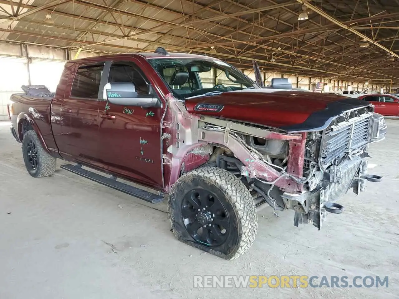 4 Photograph of a damaged car 3C6UR5NL3KG706893 RAM 2500 2019