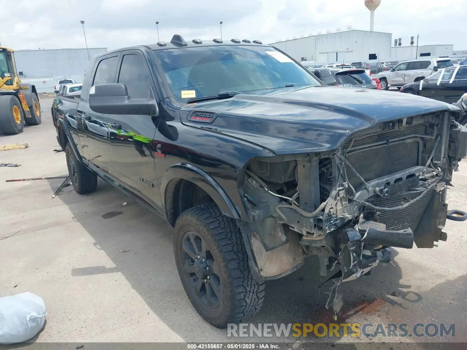 1 Photograph of a damaged car 3C6UR5NL7KG530348 RAM 2500 2019