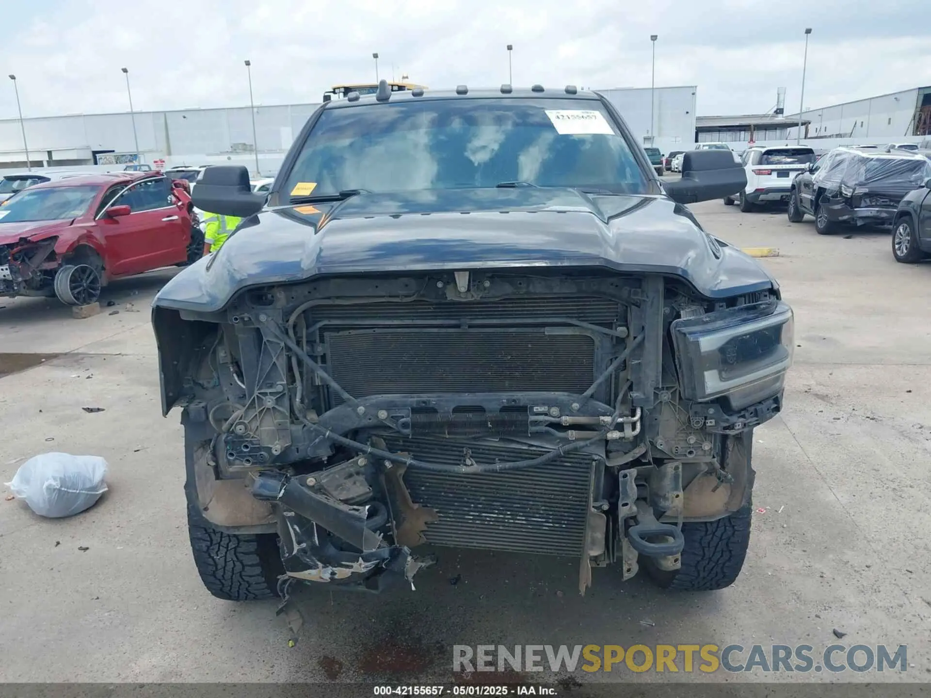 13 Photograph of a damaged car 3C6UR5NL7KG530348 RAM 2500 2019