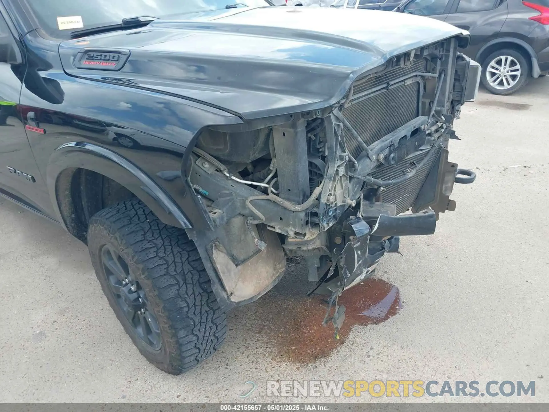 18 Photograph of a damaged car 3C6UR5NL7KG530348 RAM 2500 2019