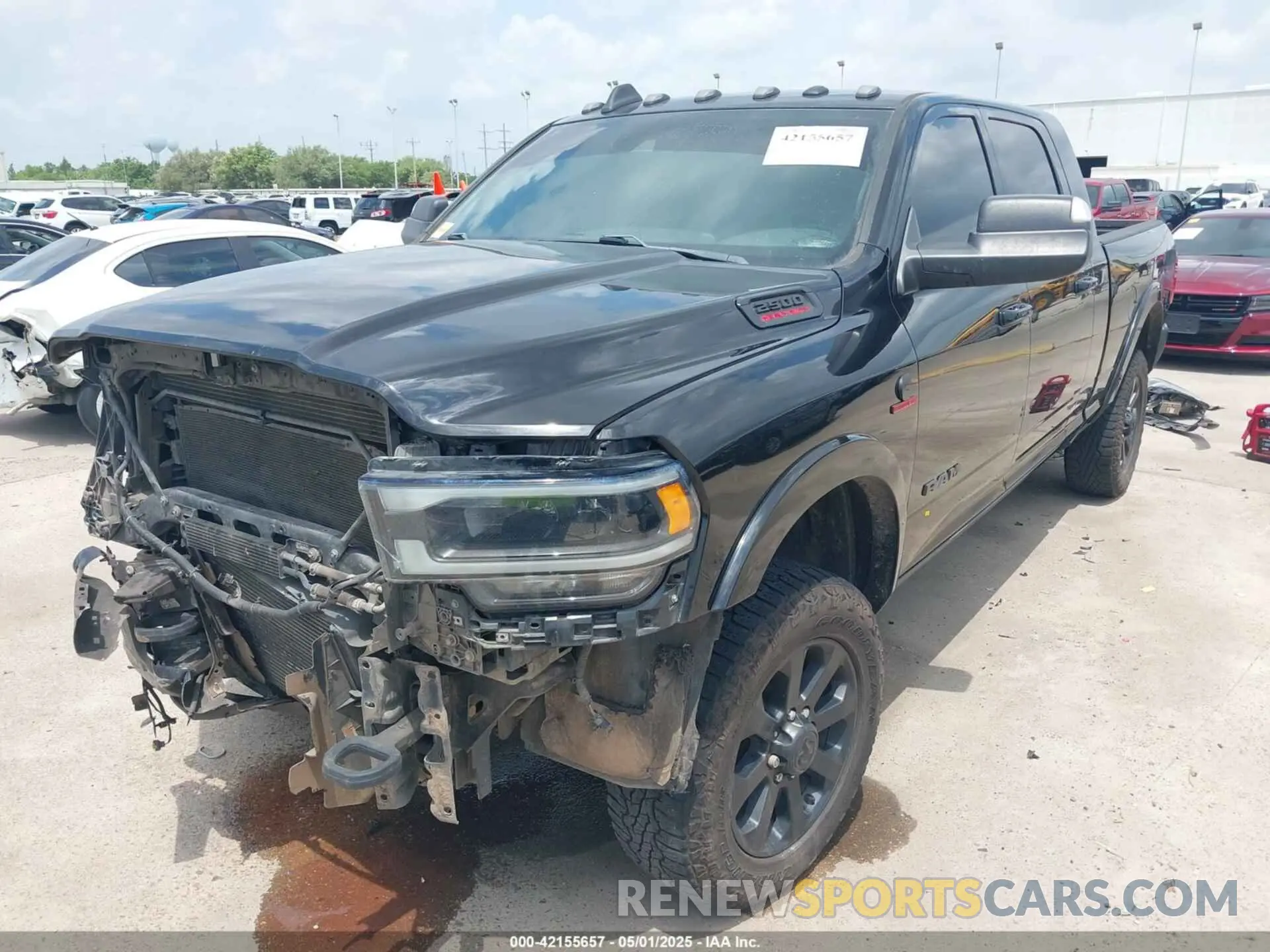 2 Photograph of a damaged car 3C6UR5NL7KG530348 RAM 2500 2019