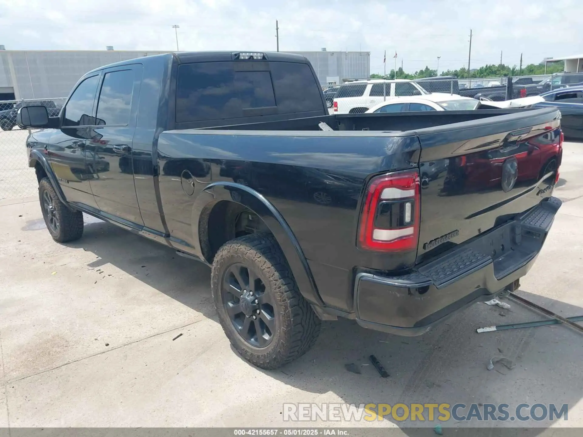 3 Photograph of a damaged car 3C6UR5NL7KG530348 RAM 2500 2019