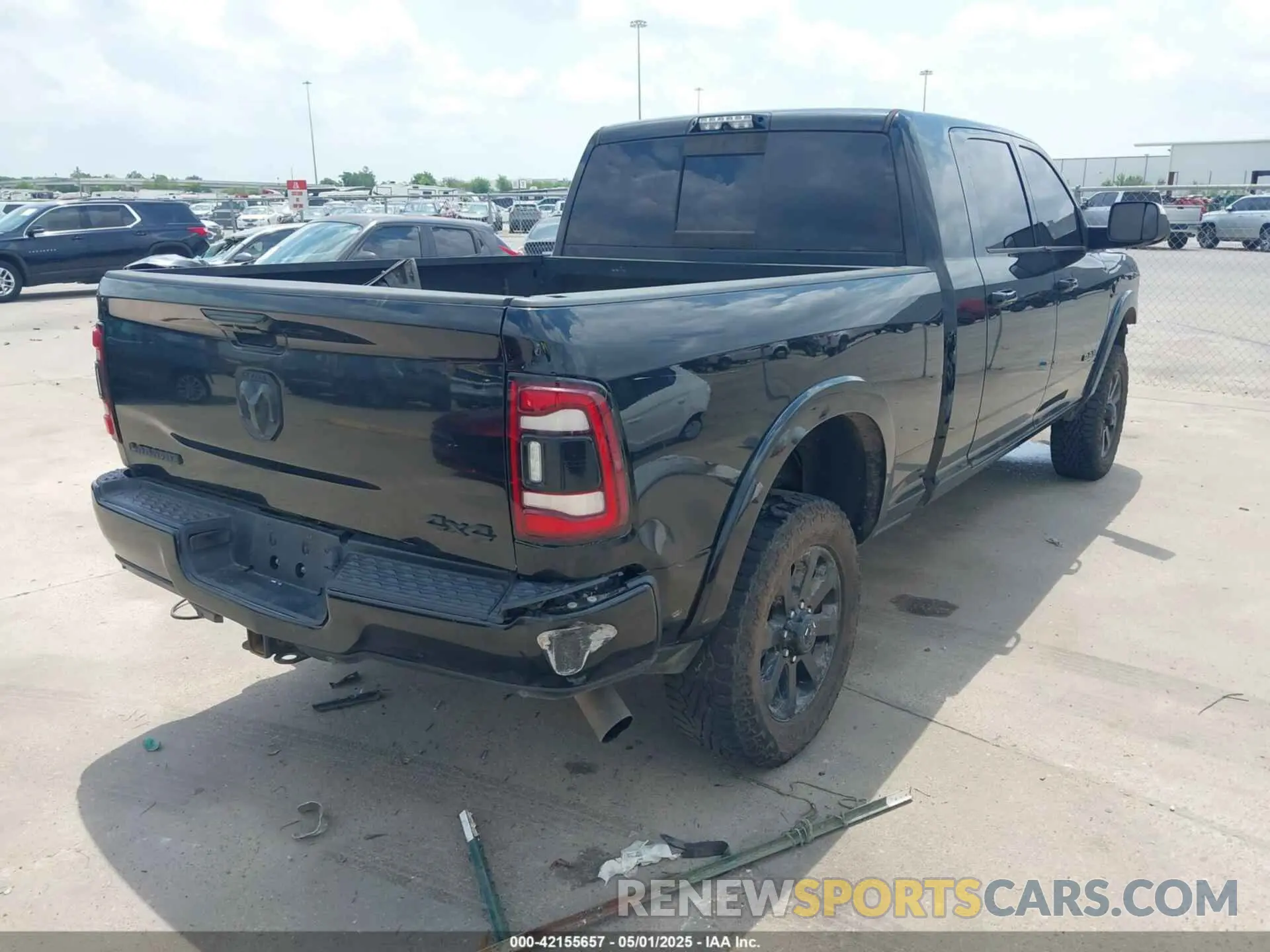 4 Photograph of a damaged car 3C6UR5NL7KG530348 RAM 2500 2019
