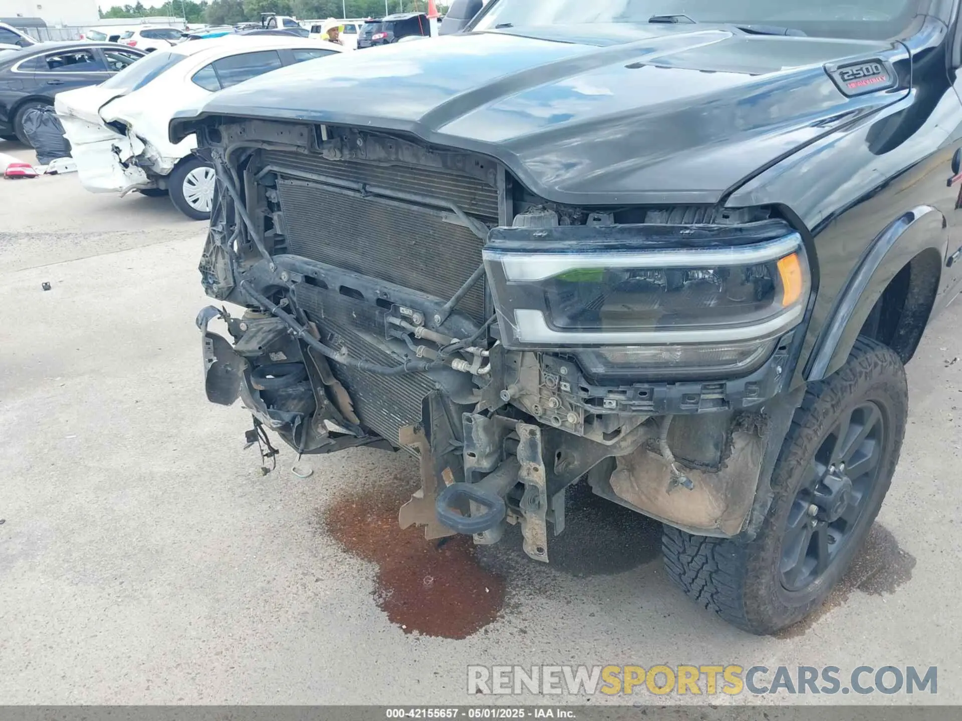 6 Photograph of a damaged car 3C6UR5NL7KG530348 RAM 2500 2019