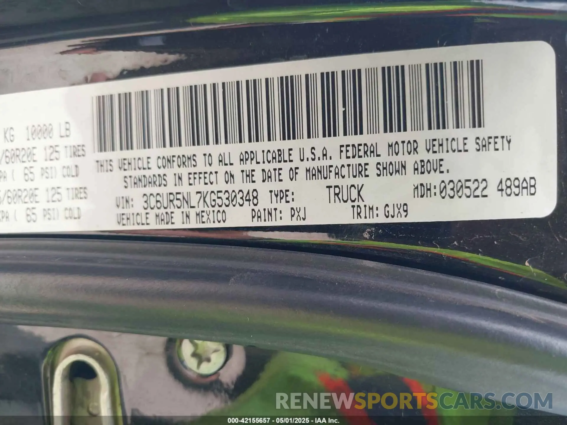 9 Photograph of a damaged car 3C6UR5NL7KG530348 RAM 2500 2019