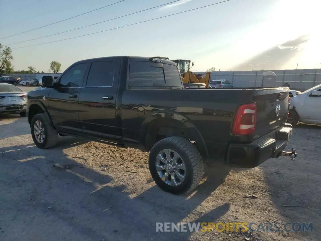 2 Photograph of a damaged car 3C6UR5SL2KG633908 RAM 2500 2019