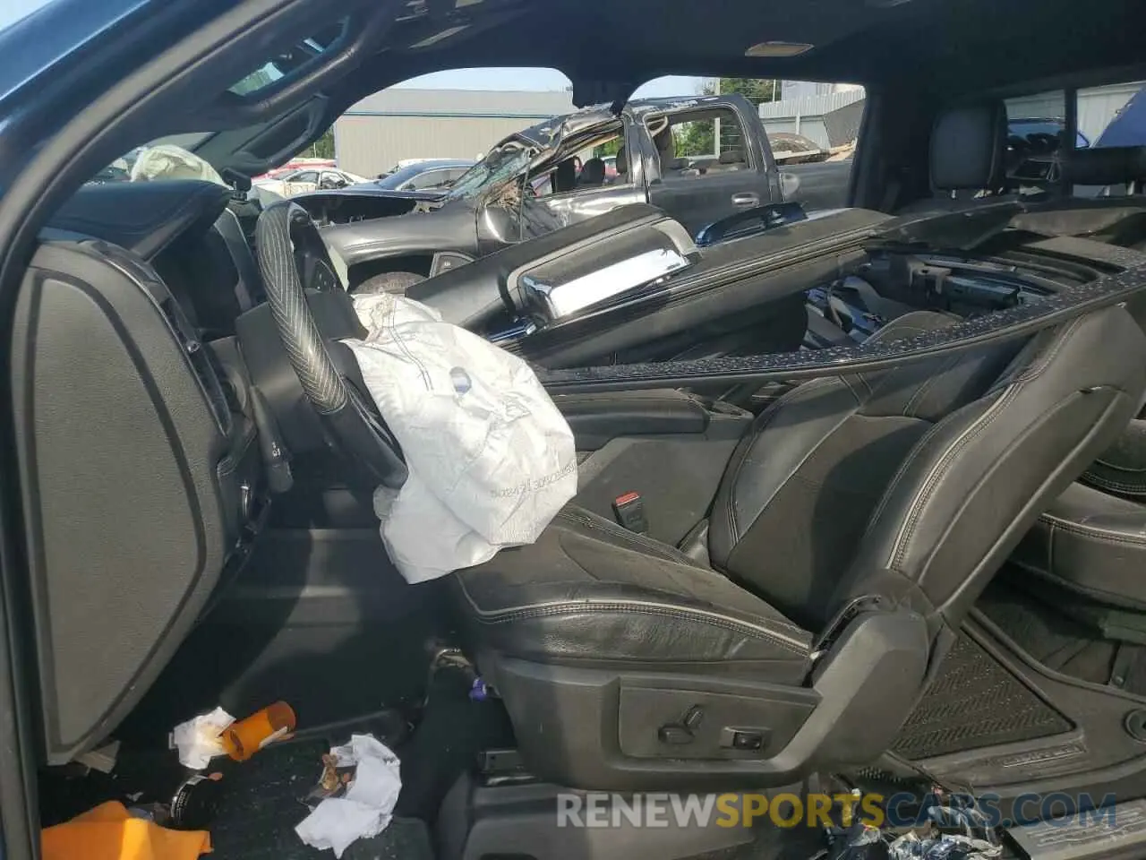 7 Photograph of a damaged car 3C6UR5SL6KG718850 RAM 2500 2019