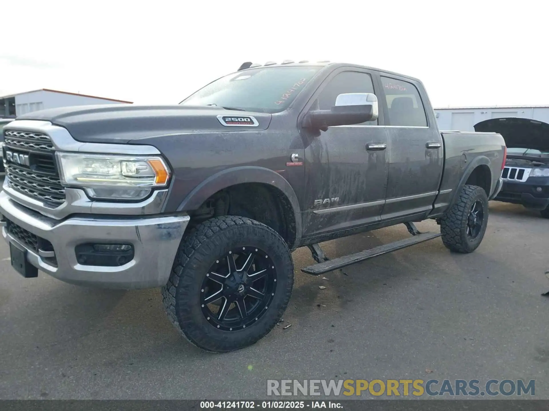 2 Photograph of a damaged car 3C6UR5SL8KG516995 RAM 2500 2019