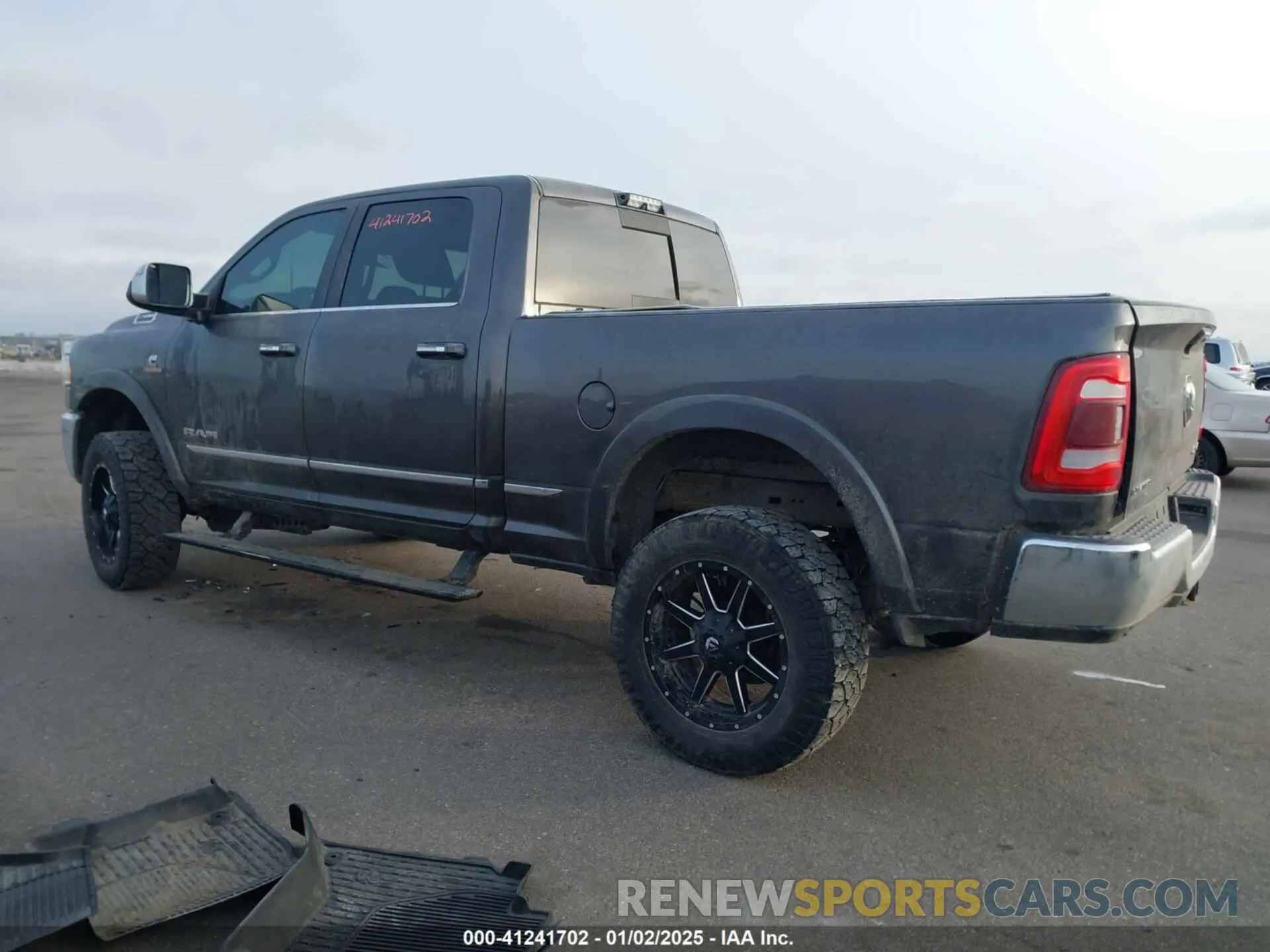 3 Photograph of a damaged car 3C6UR5SL8KG516995 RAM 2500 2019