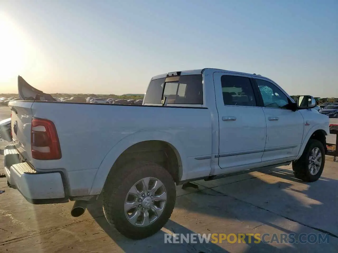 3 Photograph of a damaged car 3C6UR5SL9KG656991 RAM 2500 2019