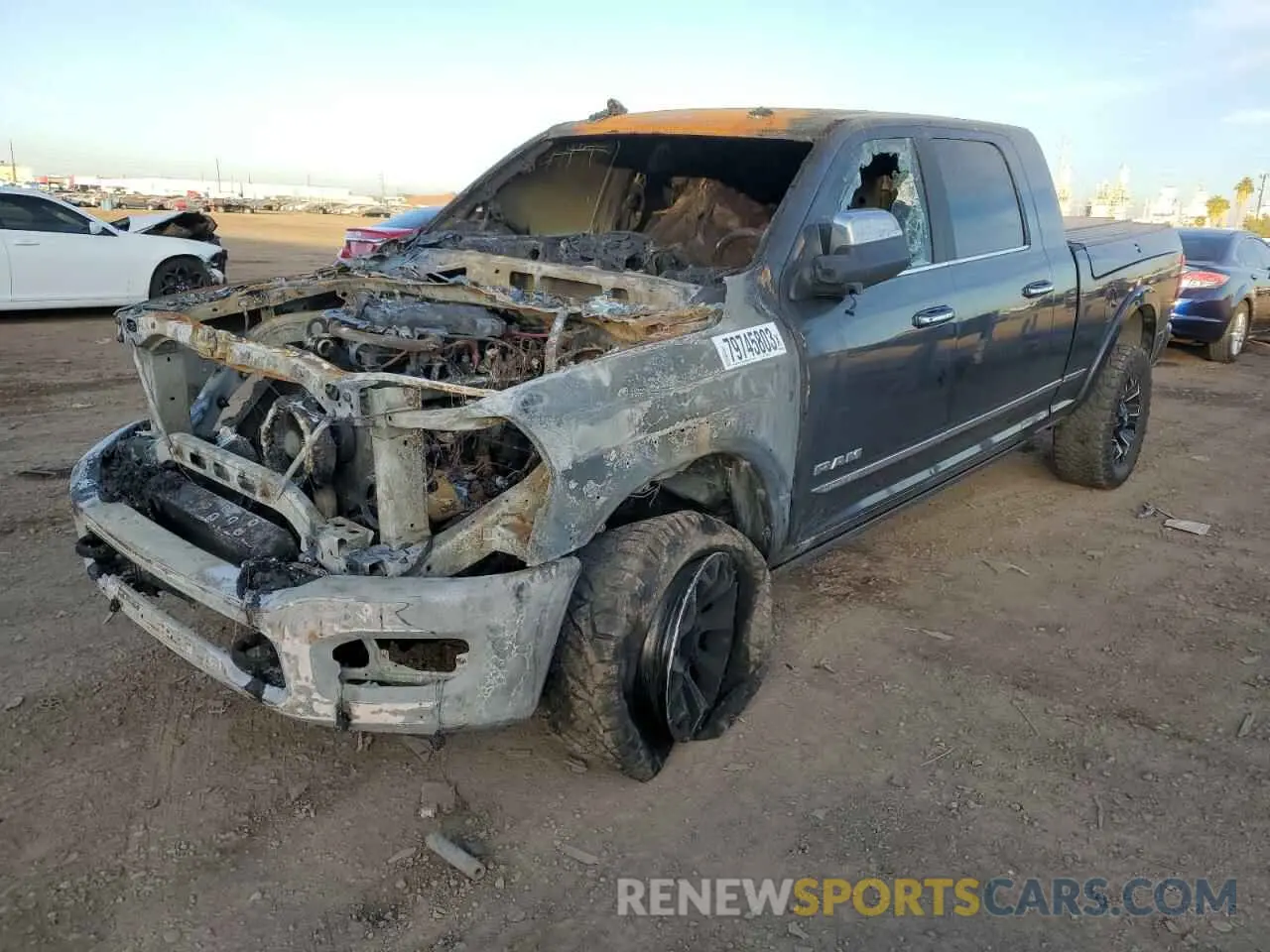 1 Photograph of a damaged car 3C6UR5TL0KG534647 RAM 2500 2019