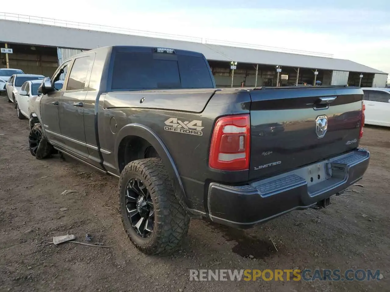 2 Photograph of a damaged car 3C6UR5TL0KG534647 RAM 2500 2019