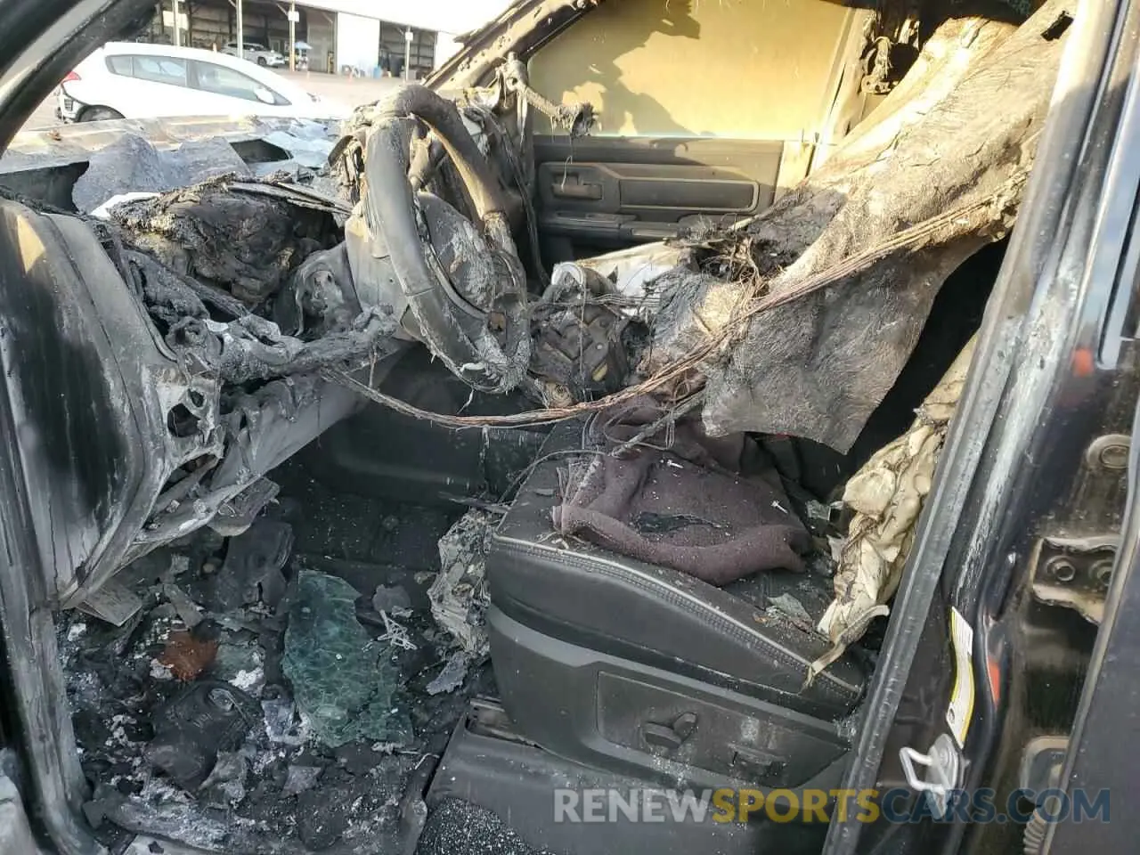 7 Photograph of a damaged car 3C6UR5TL0KG534647 RAM 2500 2019