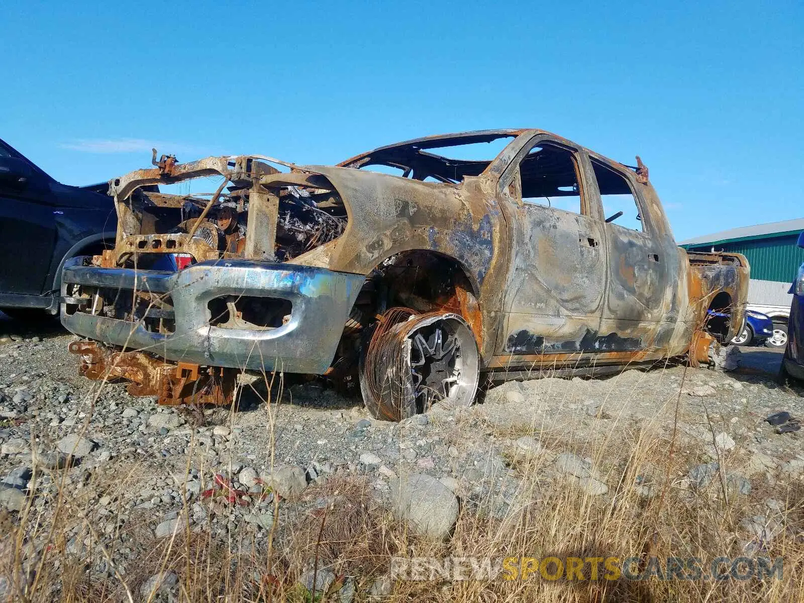 2 Photograph of a damaged car 3C6UR5TL1KG516478 RAM 2500 2019
