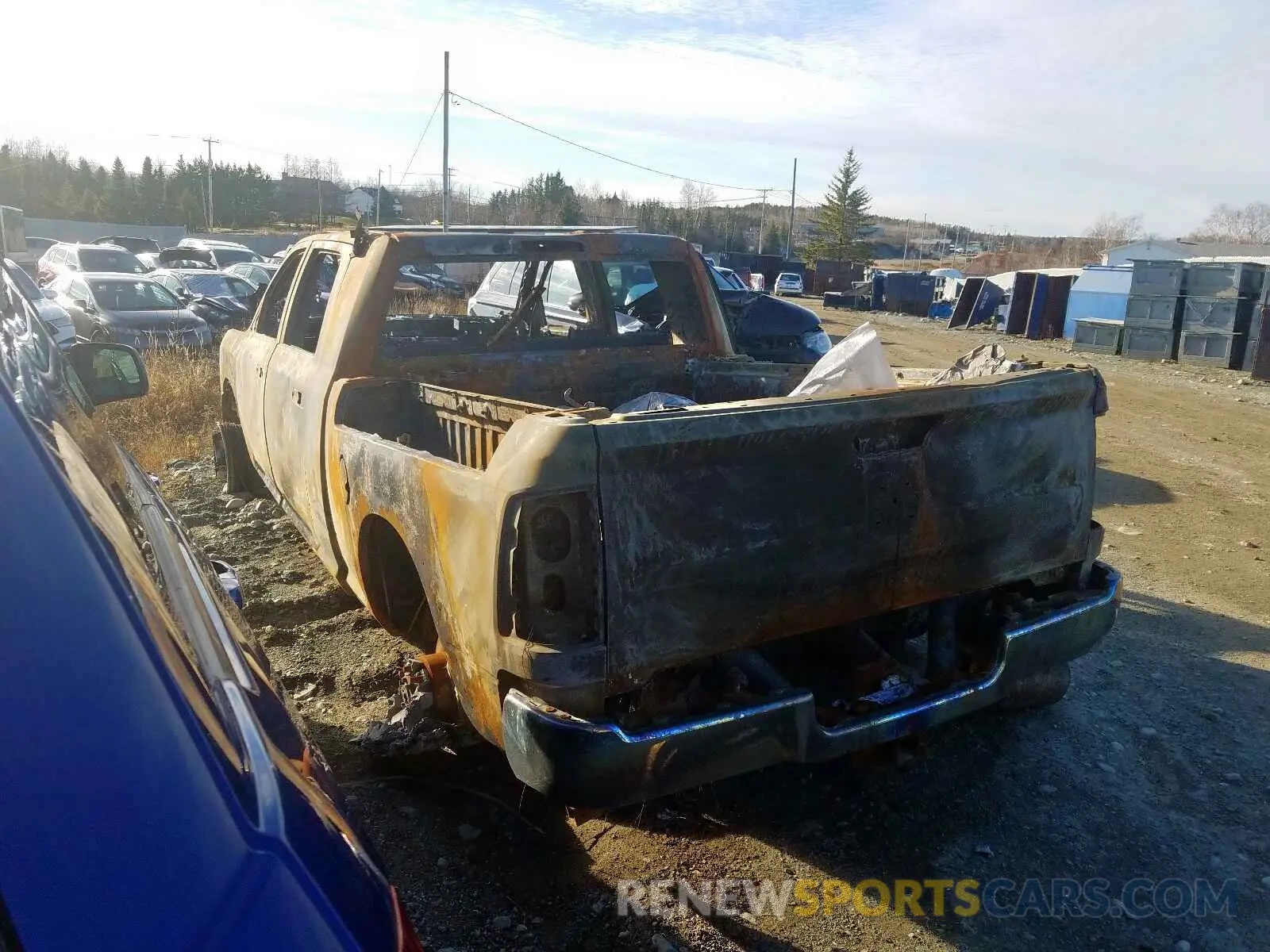 3 Photograph of a damaged car 3C6UR5TL1KG516478 RAM 2500 2019