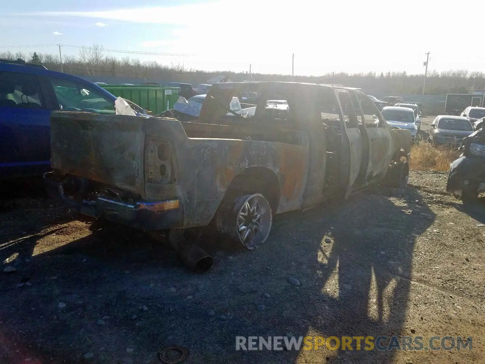 4 Photograph of a damaged car 3C6UR5TL1KG516478 RAM 2500 2019