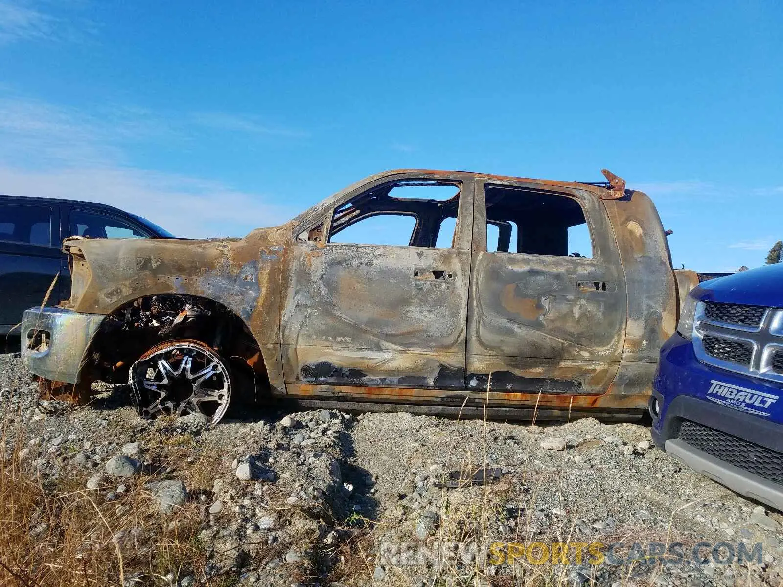 9 Photograph of a damaged car 3C6UR5TL1KG516478 RAM 2500 2019