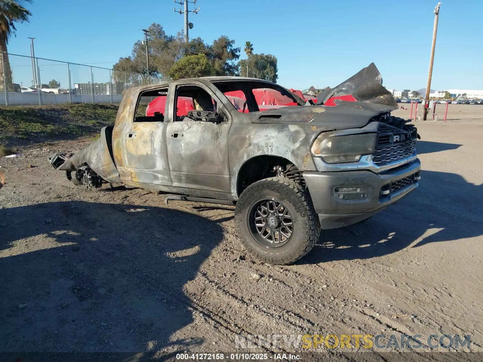 1 Photograph of a damaged car 3C6UR5TL4KG520475 RAM 2500 2019