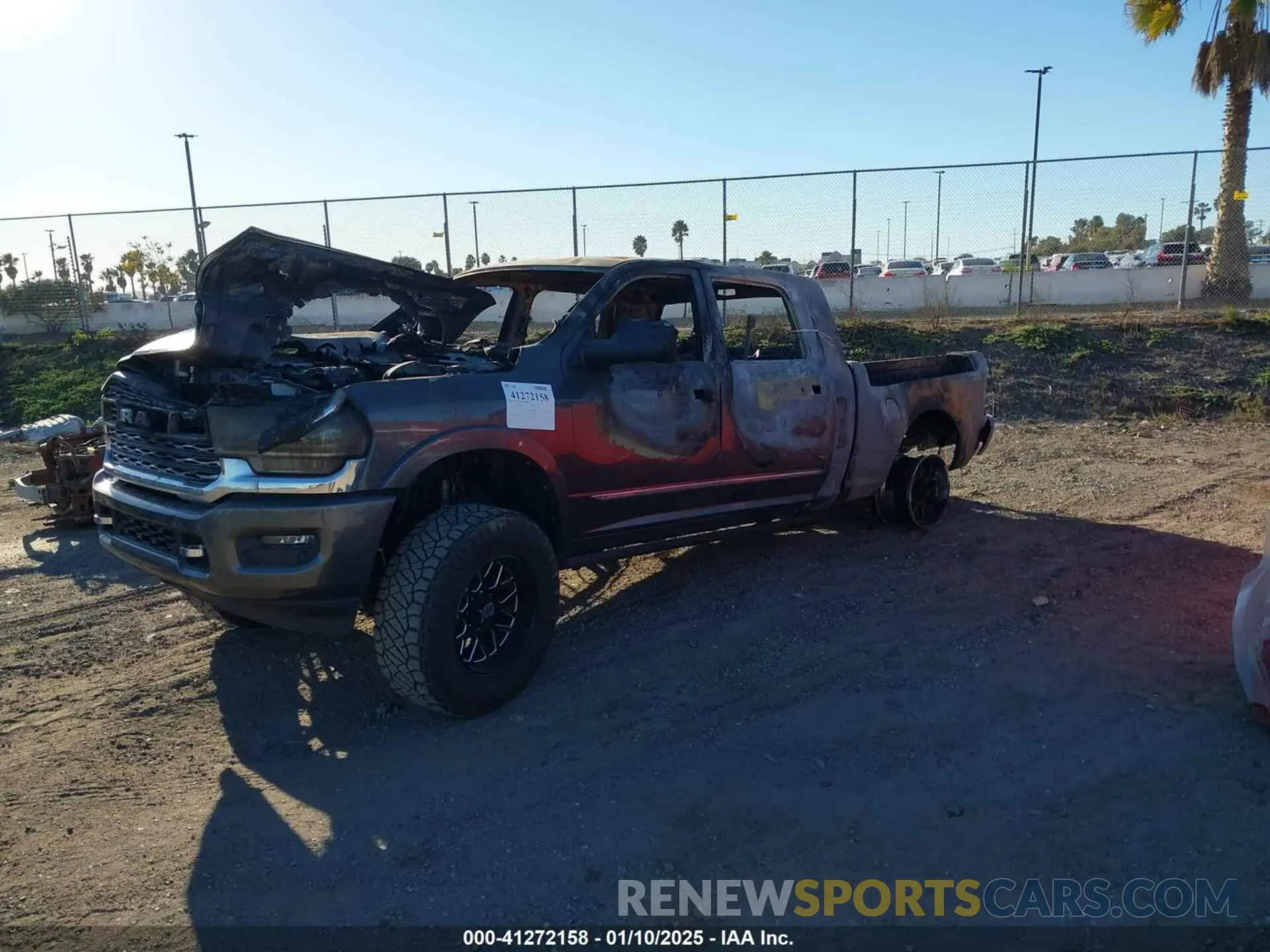 2 Photograph of a damaged car 3C6UR5TL4KG520475 RAM 2500 2019