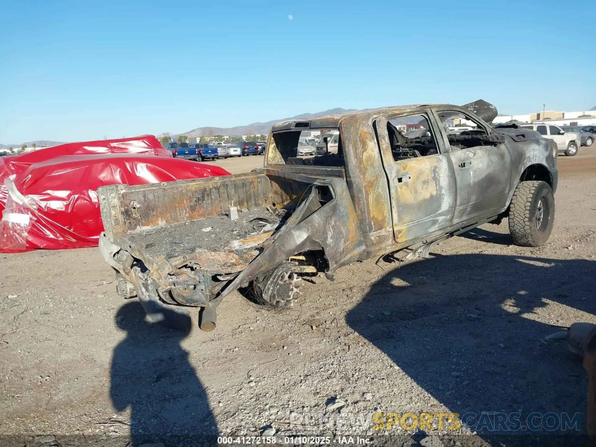 4 Photograph of a damaged car 3C6UR5TL4KG520475 RAM 2500 2019