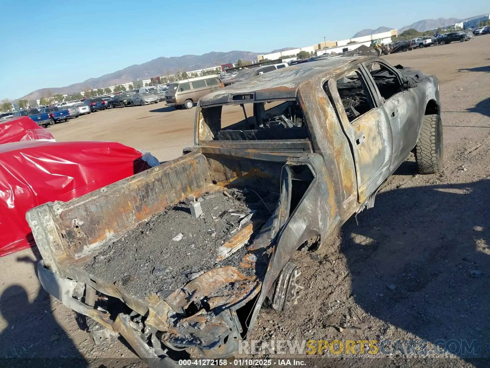 6 Photograph of a damaged car 3C6UR5TL4KG520475 RAM 2500 2019