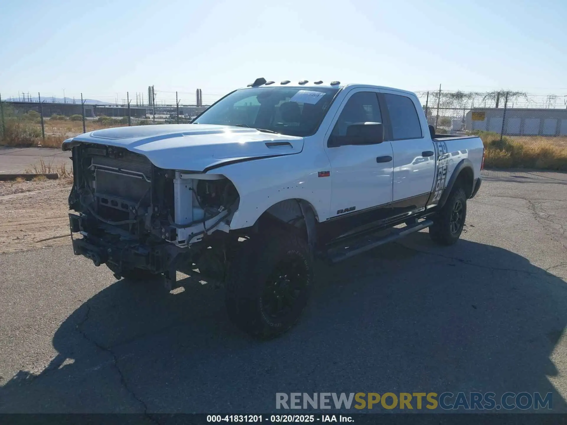 2 Photograph of a damaged car 3C6TR5EJ4LG274651 RAM 2500 2020